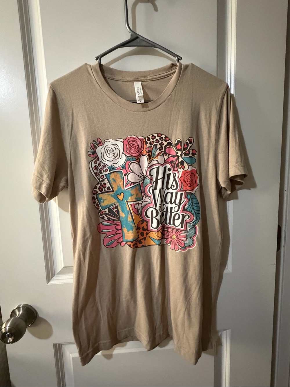 Bella Canvas Tan Graphic Tee with Multicolor Cross and Floral Design